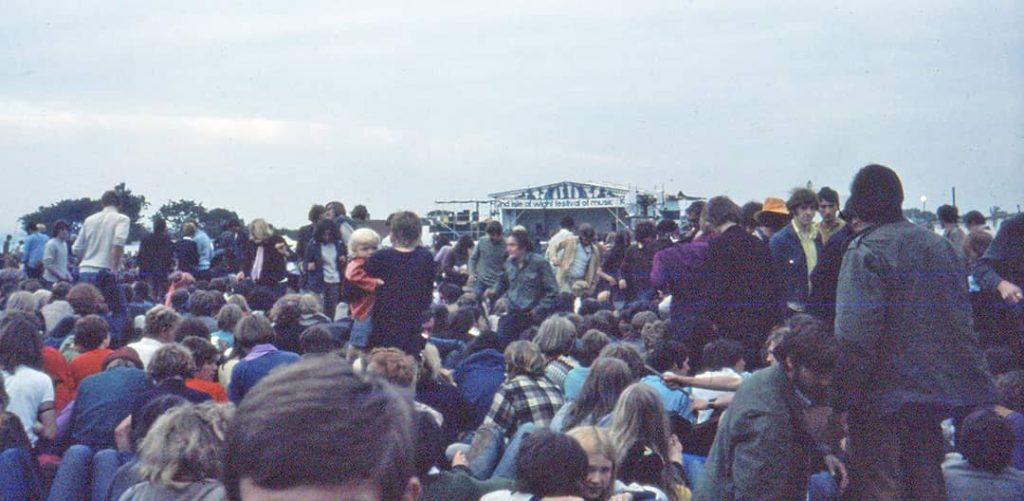 Photograph of thousands of people attending the 'Isle of Wight Festival' (1969)