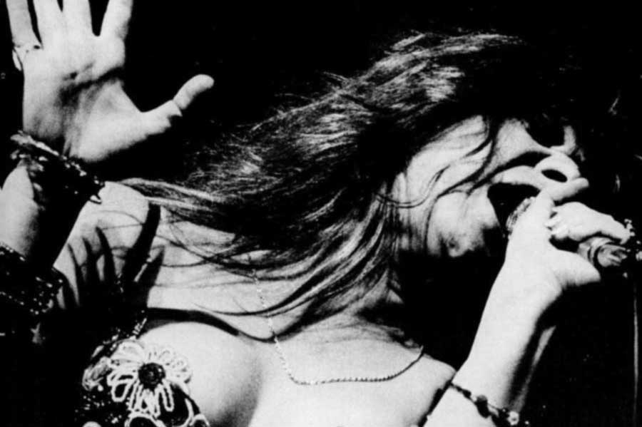 Photo of Janis Joplin performing from a trade ad for her 'Greatest Hits' album, released after her death (1973)