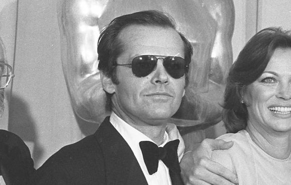 Photograph of Jack Nicholson with his Oscar at the 1976 Academy Awards (1976)
