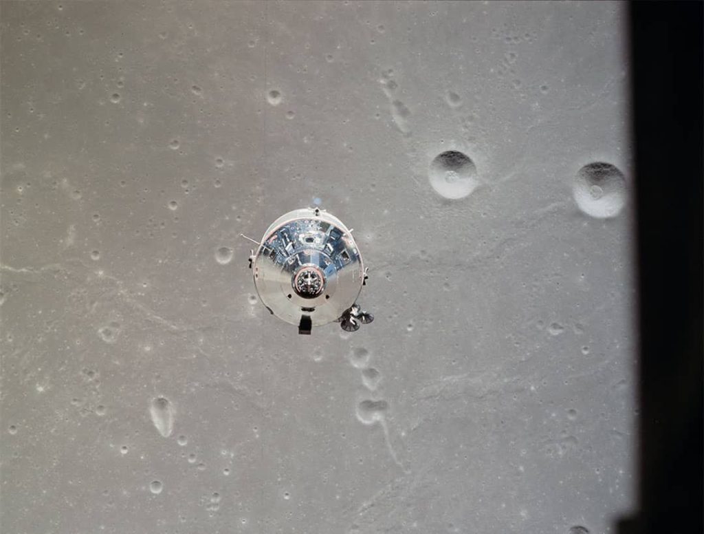 A view of the Apollo 11 Command and Service Modules photographed from the Lunar Module in lunar orbit during the Apollo 11 lunar landing mission (1969)