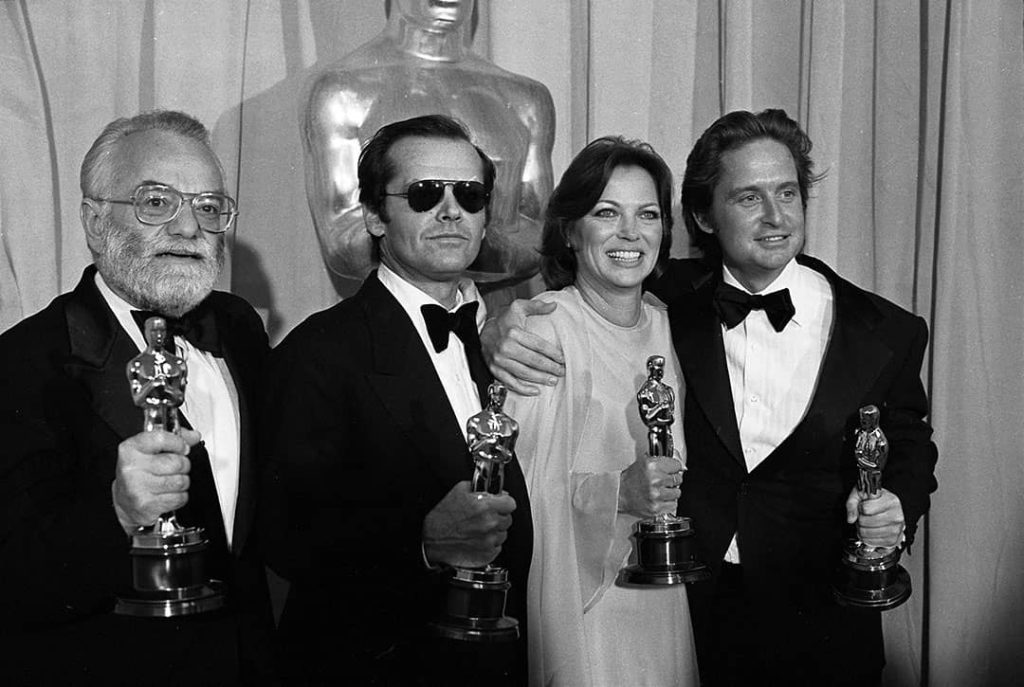 Saul Zaentz (left), Jack Nicholson (centre left), Louise Fletcher (centre right), and Michael Douglas (right) posing with their Oscars at the 1976 Academy Awards (1976)