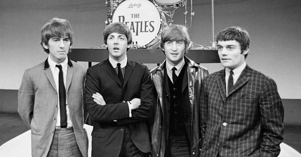 From left to right: George Harrison, Paul McCartney, John Lennon, and Jimmie Nicol after their performance in the Netherlands (1964)