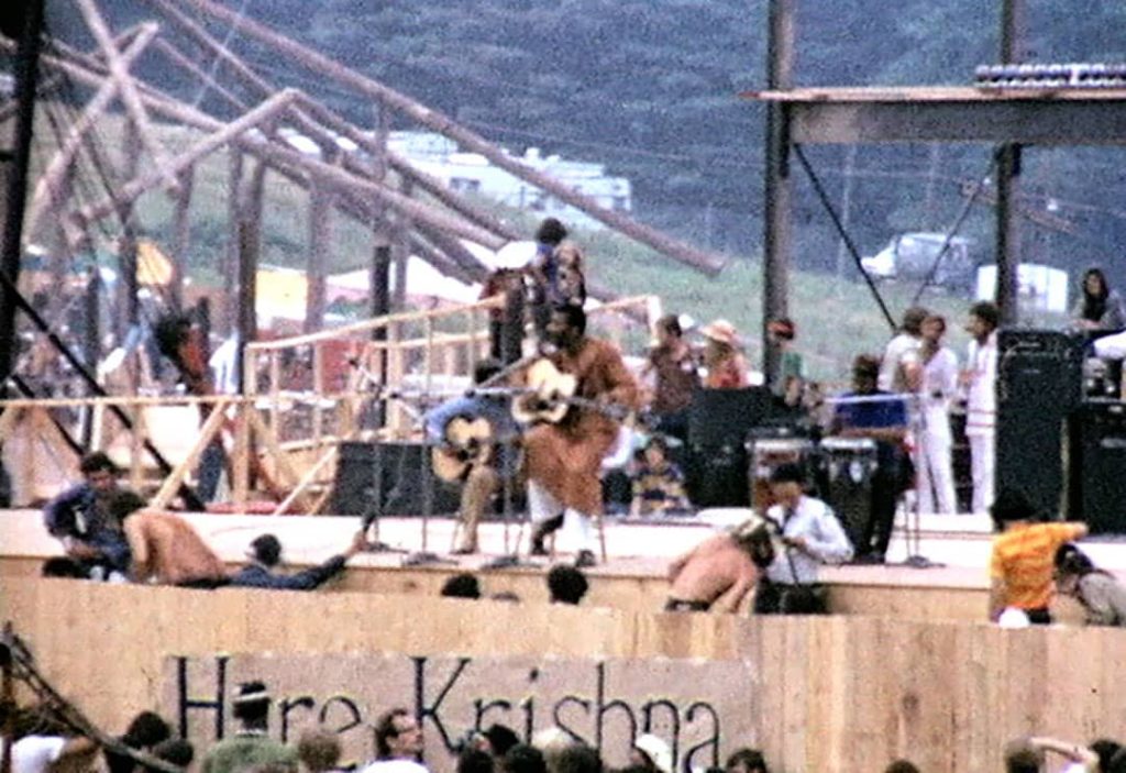 Richie Havens performing at the Woodstock Festival (1969)
